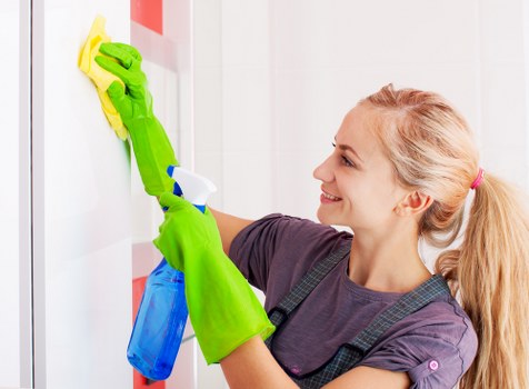 Professional cleaners in W1 working in a modern London apartment